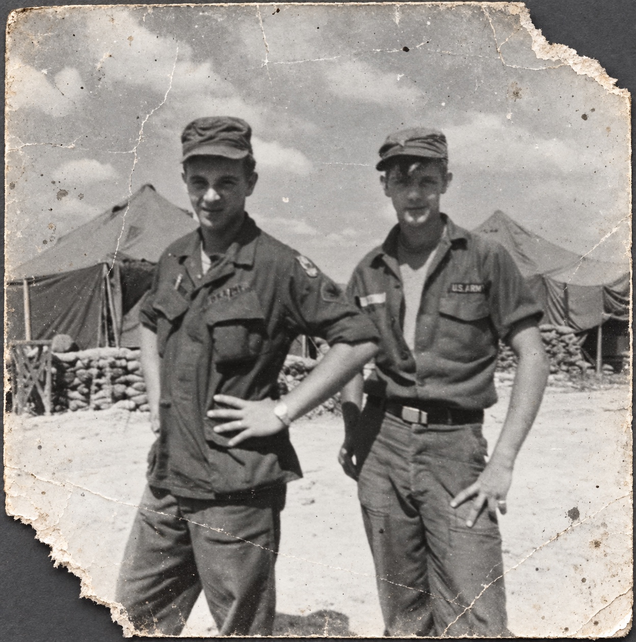 Damaged military photograph before restoration