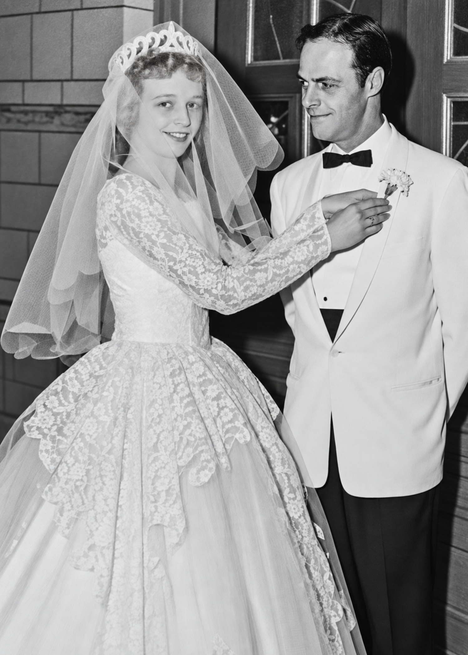 Restored black-and-white bride and groom photograph